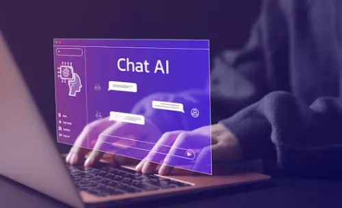 a person typing with an AI chat bot on a laptopp 